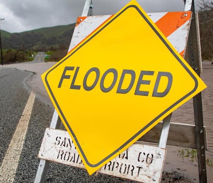 flooded roadway sign